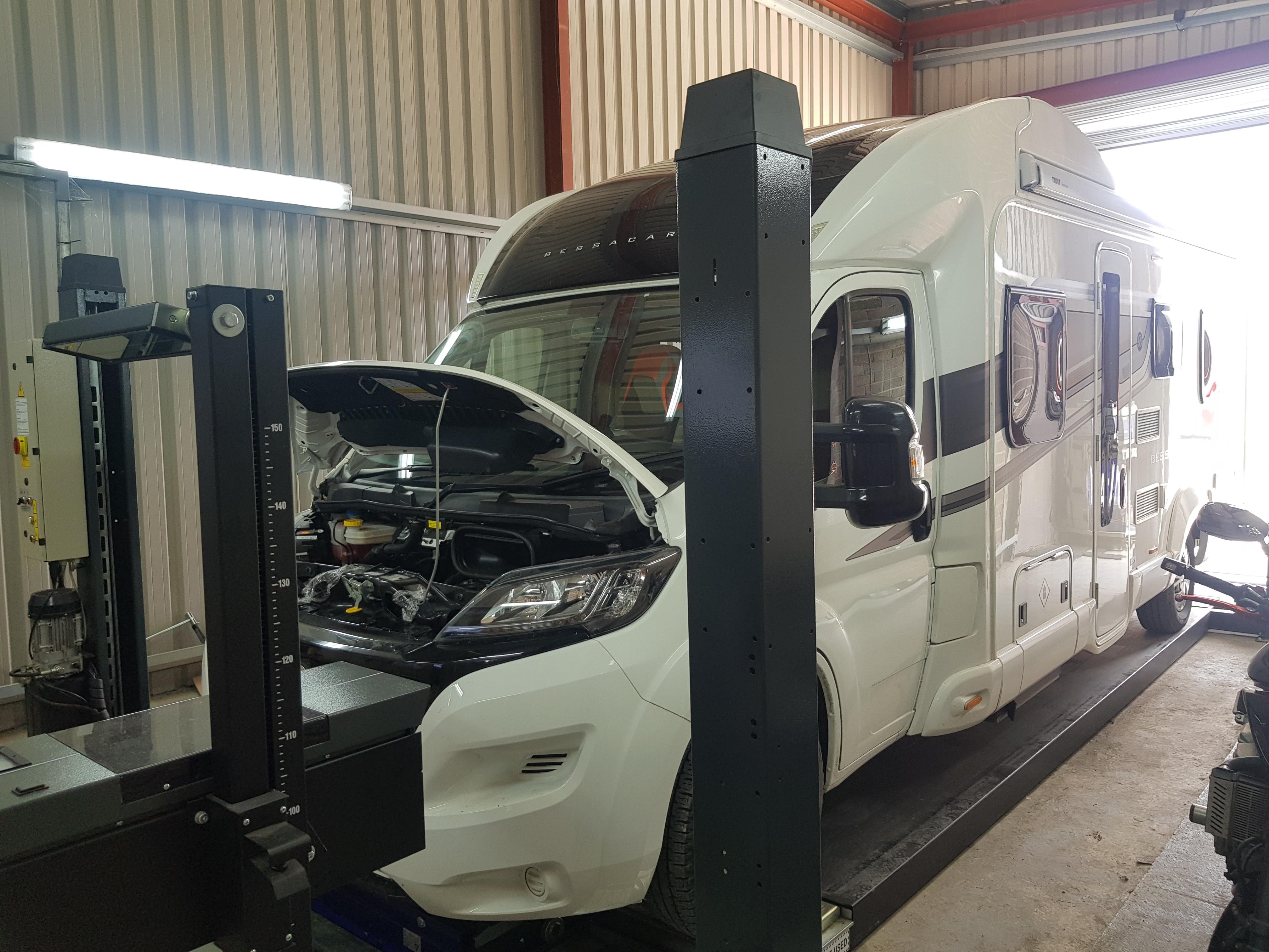 Motorhome up on the ramp for a full service